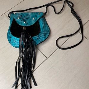 Boutique brand turquoise and black cross body bag